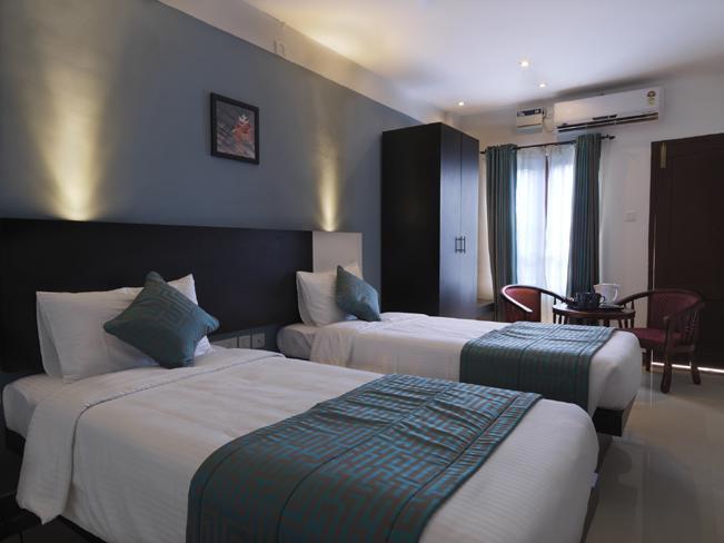 Aquarock Hotel Kazhakuttam Chambre photo