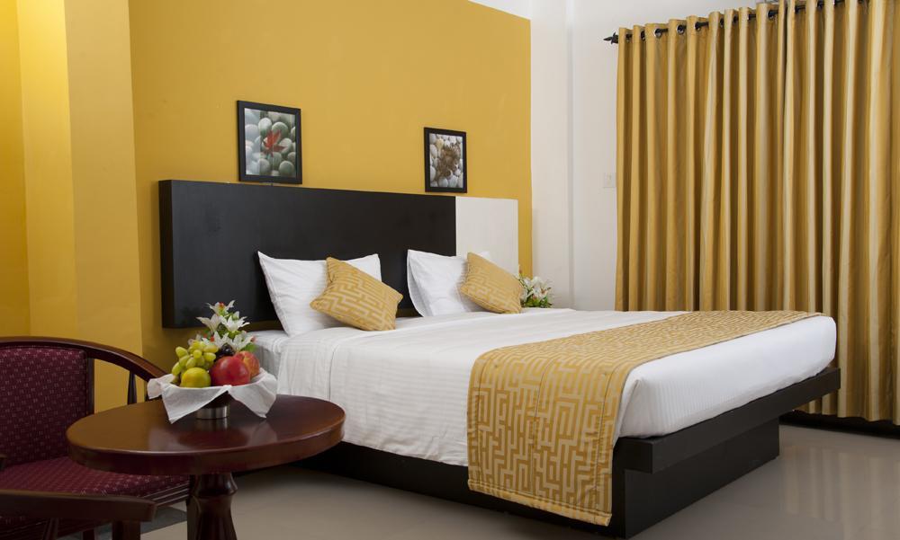 Aquarock Hotel Kazhakuttam Chambre photo